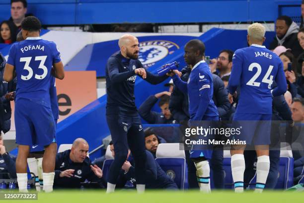 Chelsea caretaker manager Bruno Saltor with N'Golo Kante during the Premier League match between Chelsea FC and Liverpool FC at Stamford Bridge on...