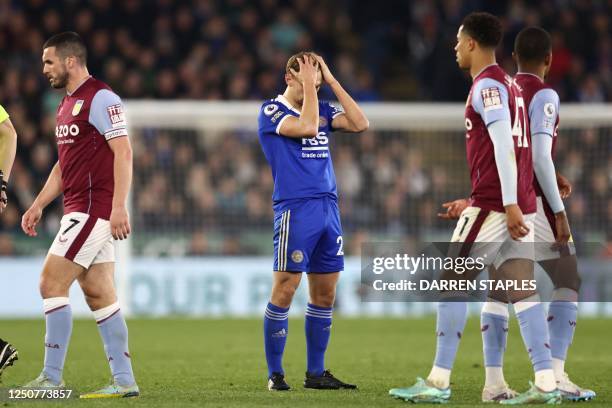 Leicester City's English midfielder Kiernan Dewsbury-Hall reacts after being sent off during the English Premier League football match between...