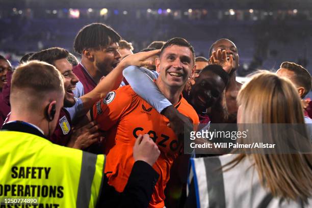 Emiliano Martinez, goalkeeper and Leon Bailey of Aston Villa celebrates victory after the Premier League match between Leicester City and Aston Villa...