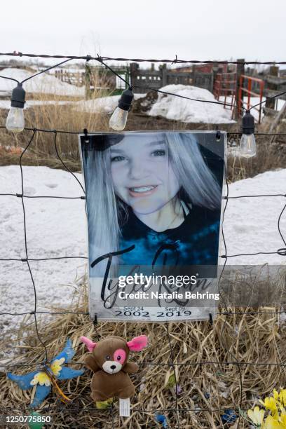 Picture of Tylee Ryan is seen on a fence opposite the property where her body was found in 2020, on April 4, 2023 in Rexburg, Idaho. The trial of the...