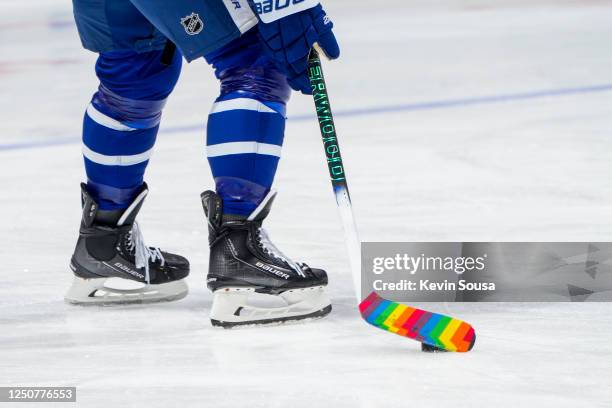 With pride tape on his stick, William Nylander of the Toronto Maple Leafs warms-up before facing the Columbus Blue Jackets at the Scotiabank Arena on...