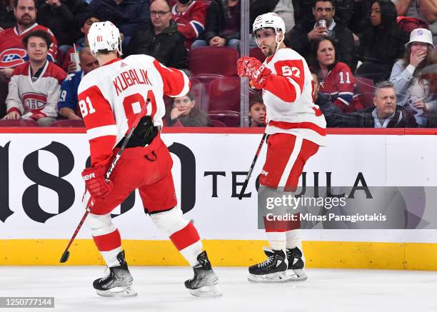 David Perron of the Detroit Red Wings celebrates his goal with teammate Dominik Kubalik during the first period against the Montreal Canadiens at...