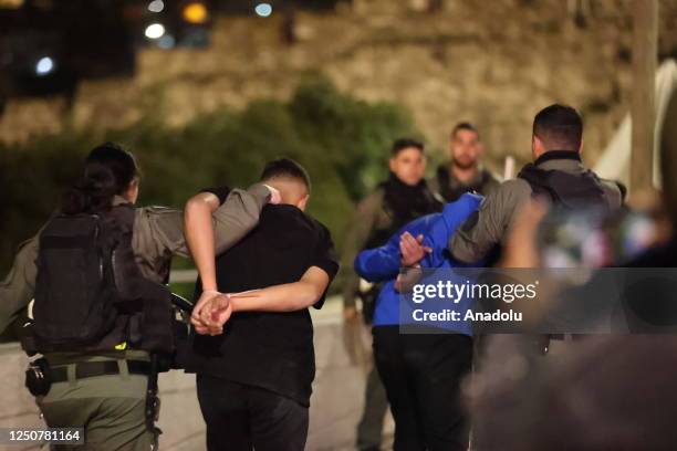 Israeli police detained some Palestinians after Israeli police again raided the Al-Aqsa Mosque complex in East Jerusalem early Sunday in Jerusalem on...