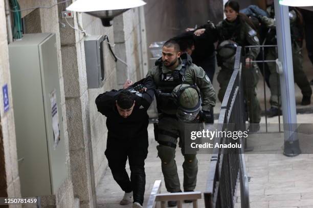 Israeli police detained some Palestinians after Israeli police again raided the Al-Aqsa Mosque complex in East Jerusalem early Sunday in Jerusalem on...