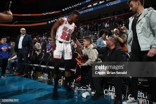 Jimmy Butler of the Miami Heat signs autograph for an after the game against the Detroit Pistons on April 4, 2023 at Little Caesars Arena in Detroit,...