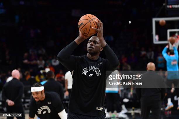 Gorgui Dieng of the San Antonio Spurs warms up before the game against the Phoenix Suns on April 4, 2023 at Footprint Center in Phoenix, Arizona....