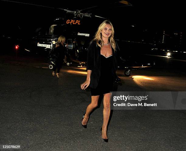 Kate Moss arrives by helicopter to the Rimmel & Kate Moss Party to celebrate their 10 year partnership at Battersea Power station on September 15,...