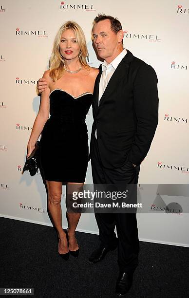 Kate Moss and CEO of COTY Inc. Bernd Beetz attend the Rimmel & Kate Moss Party to celebrate their 10 year partnership at Battersea Power station on...