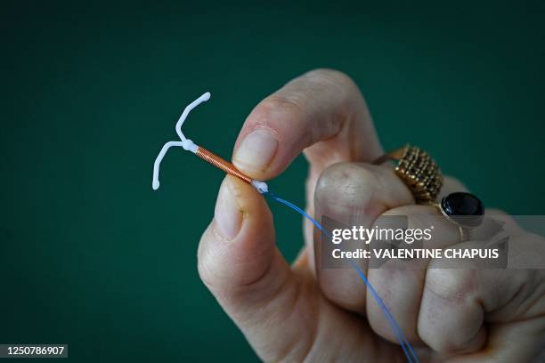 This photograph taken on March 30 shows a copper IUD in Toulouse, southwestern France.