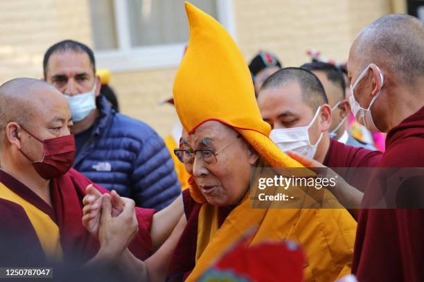 Tibetan spiritual leader Dalai Lama arrives to attend a prayer at the Main Tibetan Temple in McLeod Ganj on April 5, 2023.