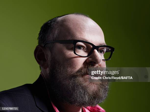 Writer and producer Dennis Kelly is photographed for BAFTA on April 4, 2014 in London, England.