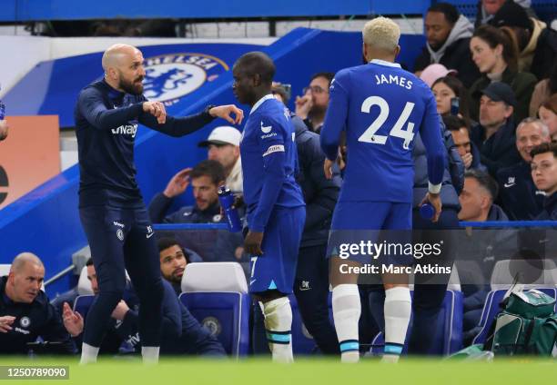 Chelsea caretaker manager Bruno Saltor with N'Golo Kante during the Premier League match between Chelsea FC and Liverpool FC at Stamford Bridge on...