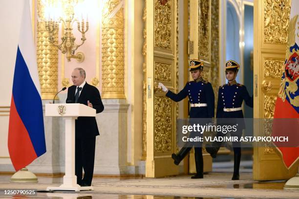 Russian President Vladimir Putin delivers a speech at a ceremony to receive credentials from newly appointed foreign ambassadors to Russia at the...