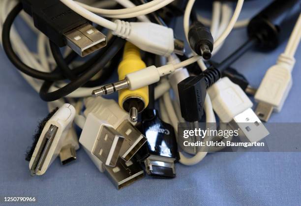 The photo illustration on the topic of cable clutter shows different electrical cables and chargers on April 05, 2023 in Bonn, Germany.