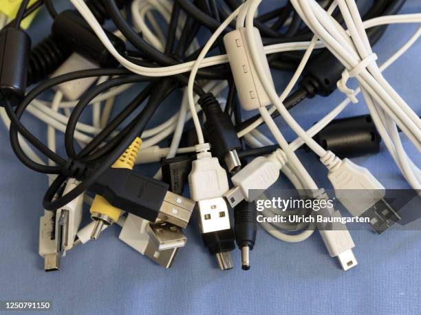 The photo illustration on the topic of cable clutter shows different electrical cables and chargers on April 05, 2023 in Bonn, Germany.