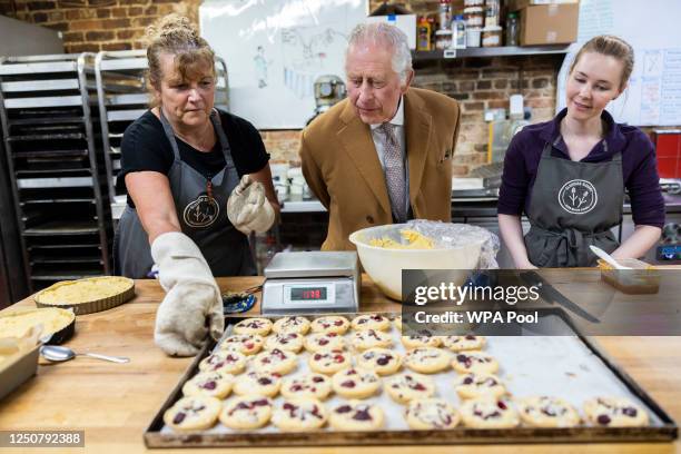 King Charles III is seen during his visit to Talbot Yard Food Court on April 05, 2023 in Malton, England. The King and Queen Consort are visiting...