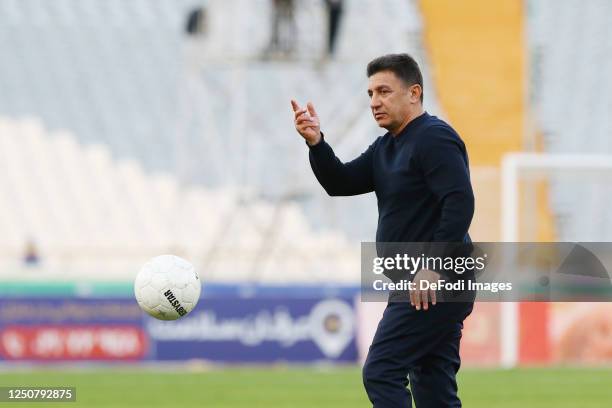 Head coach Amir Ghalenoei of Gol Gohar FC, looks on during the Persian Gulf Pro League match between Esteghlal and Gol Gohar FC at Azadi Stadium on...