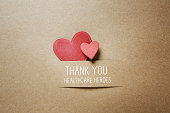 Thank You Healthcare Heroes message with small hearts
