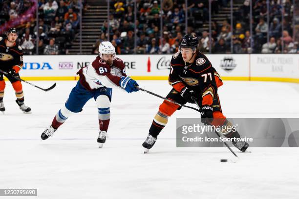 Colorado Avalanche center Denis Malgin and Anaheim Ducks right wing Frank Vatrano during an NHL hockey game on March 27, 2023 at the Honda Center in...