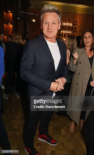 Gordon Ramsay and guest attend the GQ Food & Drink Awards 2023 at the St Pancras Renaissance Hotel on April 5, 2023 in London, England.