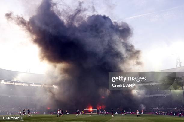 Fireworks Feyenoord supporters during the Semifinal of the KNVB Cup match between Feyenoord and Ajax at Feyenoord Stadion de Kuip on April 5, 2023 in...