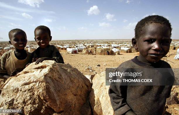 Sudan's children refugees pose in front of their camp in Iridimi with 15.000 other refugees, after they have fled the Darfur region where rebels...