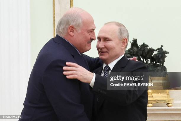 Russian President Vladimir Putin meets with Belarusian President Alexander Lukashenko at the Kremlin in Moscow on April 5, 2023.