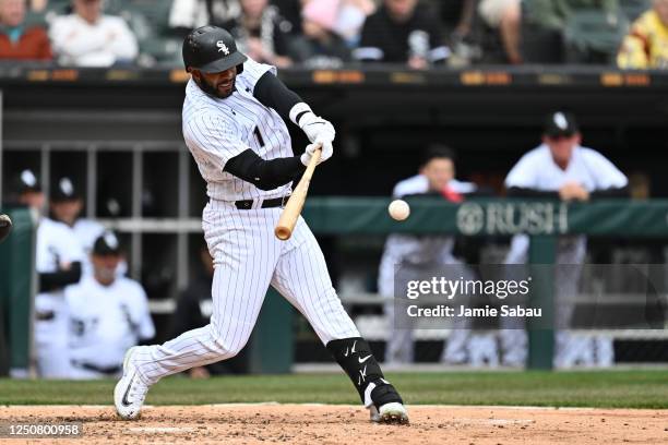 Elvis Andrus of the Chicago White Sox hits a single for his 2000th career hit in the fifth inning against the San Francisco Giants at Guaranteed Rate...