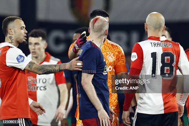 Quilindschy Hartman of Feyenoord, Davy Klaassen of Ajax with blood on the back of his head, Gernot Trauner of Feyenoord during the Semifinal of the...