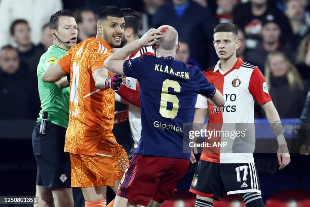 Davy Klaassen of Ajax is hit by an object during the Semifinal of the TOTO KNVB Cup match between Feyenoord and Ajax at Feyenoord Stadion de Kuip on...