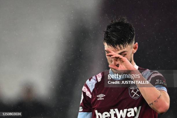 West Ham United's English midfielder Declan Rice reacts at the end of the English Premier League football match between West Ham United and Newcastle...