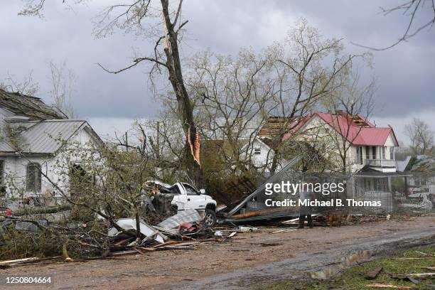 Man surveys the wreckage and debris outside his destroyed home on April 5, 2023 in Glenallen, Missouri. At least four people have reportedly been...
