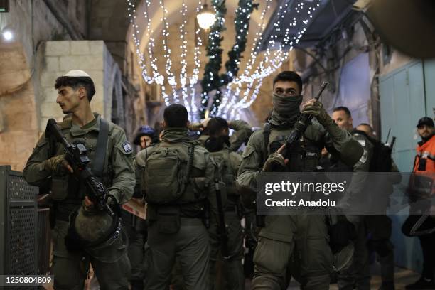 Israeli police force people out of the Chain Gate as they raid Masjid al-Aqsa in Jerusalem on April 05, 2023.