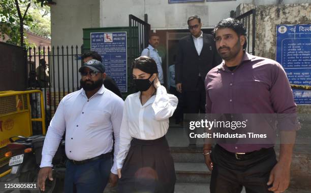 Actor Jacqueline Fernandez leave at Patiala House Court after appearing in connection with hearing in RS 200 crore money laundering case on April 5,...
