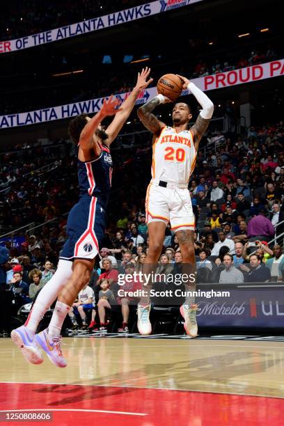 John Collins of the Atlanta Hawks shoots the ball during the game against the Washington Wizards on April 5, 2023 at State Farm Arena in Atlanta,...