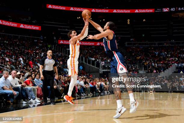 Trae Young of the Atlanta Hawks shoots the ball during the game against the Washington Wizards on April 5, 2023 at State Farm Arena in Atlanta,...