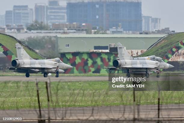 French-made Mirage fighter jets are seen at an air force base in Hsinchu, northern Taiwan on April 6, 2023. - Taiwan's defence ministry said on April...