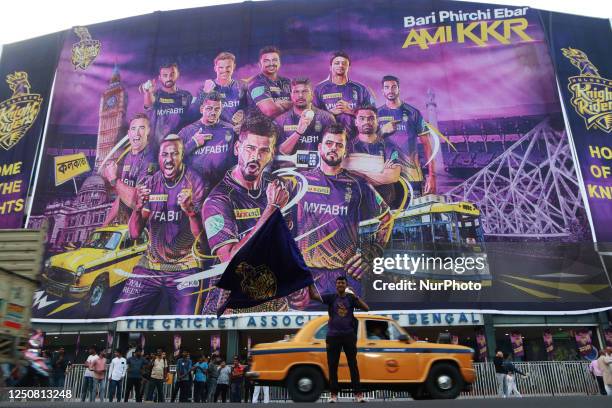 Fan of Kolkata Knight Riders wave the KKR Flag in front of Eden Gardens Cricket Stadium during the IPL T-20 in Kolkata,India on April 05,2023.