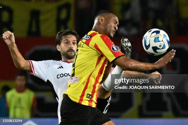 Colo-Colo's Argentine forward Agustin Bouzat and Deportivo Pereira's forward Angelo Rodriguez vie for the ball during the Copa Libertadores group...