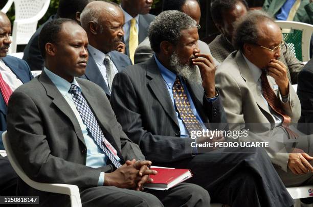 Somali faction leaders Hussein Mohamed Aidid, Musa Sudi Yalhow and the prime minister of Transitional National Government Hassan Abshiir listen to...