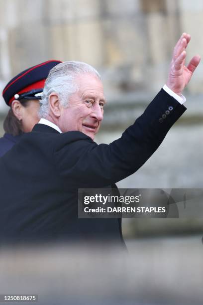 Britain's King Charles III waves as he arrives with Britain's Camilla, Queen Consort at York Minster for the distribution of the Maundy money to 74...