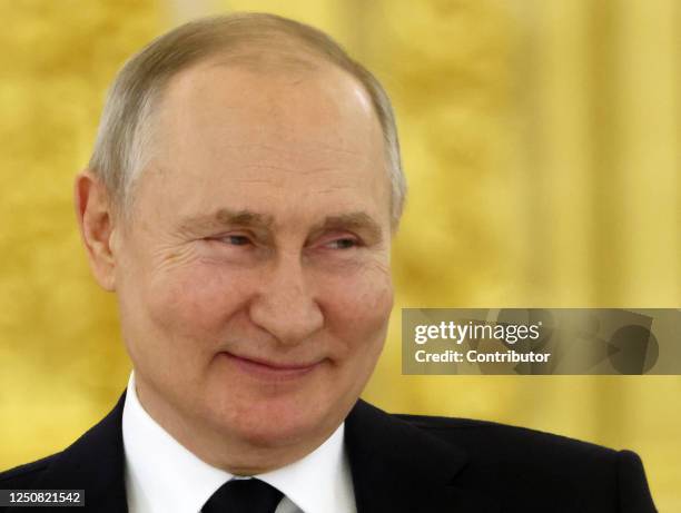 Russian President Vladimir Putin reacts during the summit of Russian-Belarussian Supreme State Council, at the Grand Kremlin Palace, on April 6, 2023...