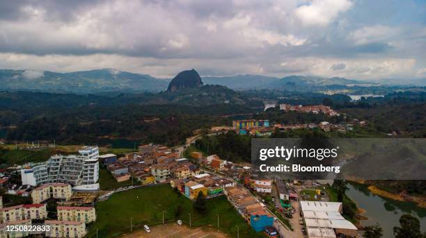 The Piedra del Penol rock in Guatape, Colombia, on Wednesday, April 5, 2023. In Colombia, annual inflation unexpectedly accelerated in March to...