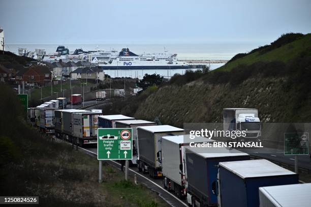 Freight lorries, HGVs and cars, queue on the A20 road towards the Port of Dover on April 6, 2023 as French demonstrators caused travel disruption on...