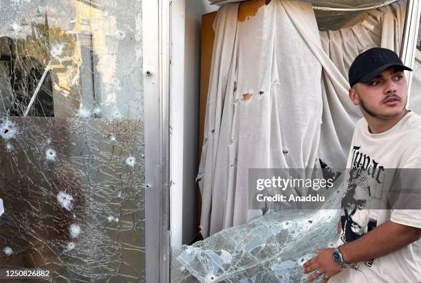 View of the damage after at least 30 rockets were fired from southern Lebanon toward Israel's Shlumi neighborhood in Nahariyya on April 06, 2023.