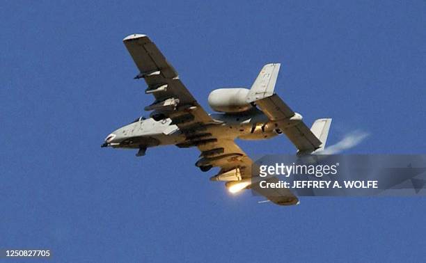 Pilot in an A-10 Thunderbolt II drops a flare over Kirkuk 17 November 2003 during Operation Ivy Cyclone. The operation is a combined-arms operation...