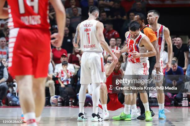 Facundo Campazzo of Crvena Zvezda mts Belgrade helps to Thomas Walkup of Olympiacos Piraeus to stand up during the 2022/2023 Turkish Airlines...