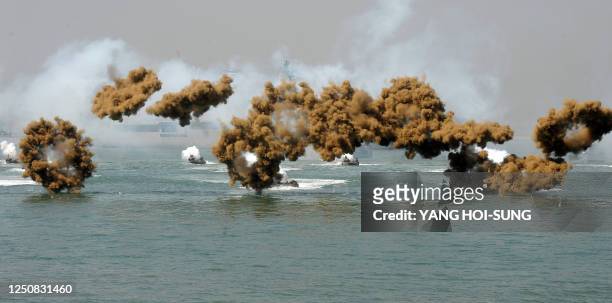 Amphibious vehicles take part in a landing operation in the sea off Incheon, west of Seoul on September 15, 2010 as South Korea, the United States...