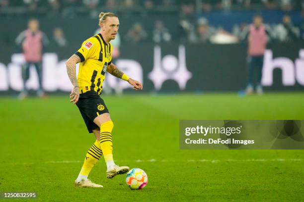 Marius Wolf of Borussia Dortmund controls the ball during the Bundesliga match between FC Schalke 04 and Borussia Dortmund at Veltins-Arena on March...