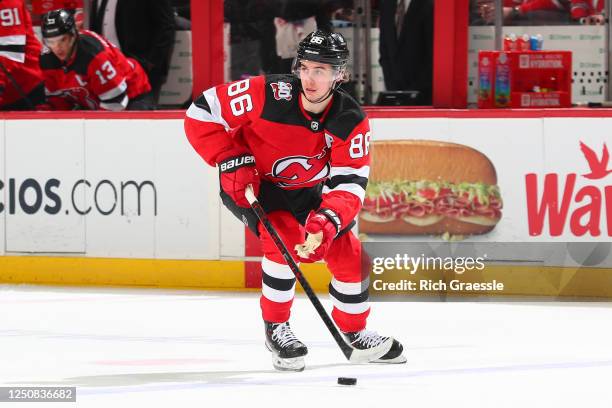 Jack Hughes of the New Jersey Devils skates in the first period of the game against the Columbus Blue Jackets on April 6, 2023 in Newark, New Jersey.